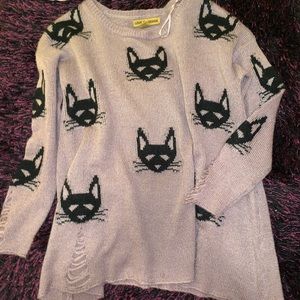 Car sweater with rip detail